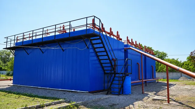 Modular treatment tanks with access stairs and connecting pipework